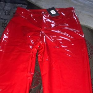 Red vinyl pants , never worn brand new with tags